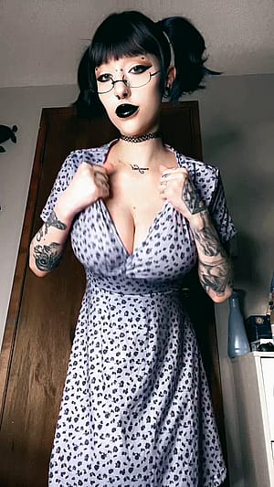 This goth milf will be wearing nothing but sundresses all summer long'